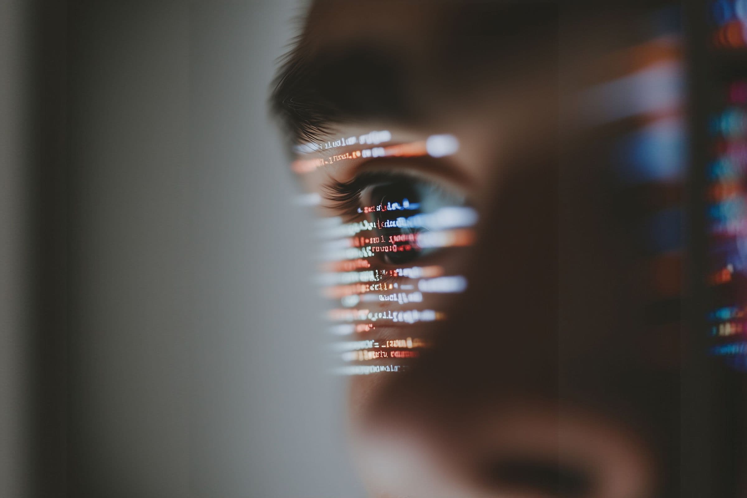 Abstract data visualisation reflected in a pair of glasses