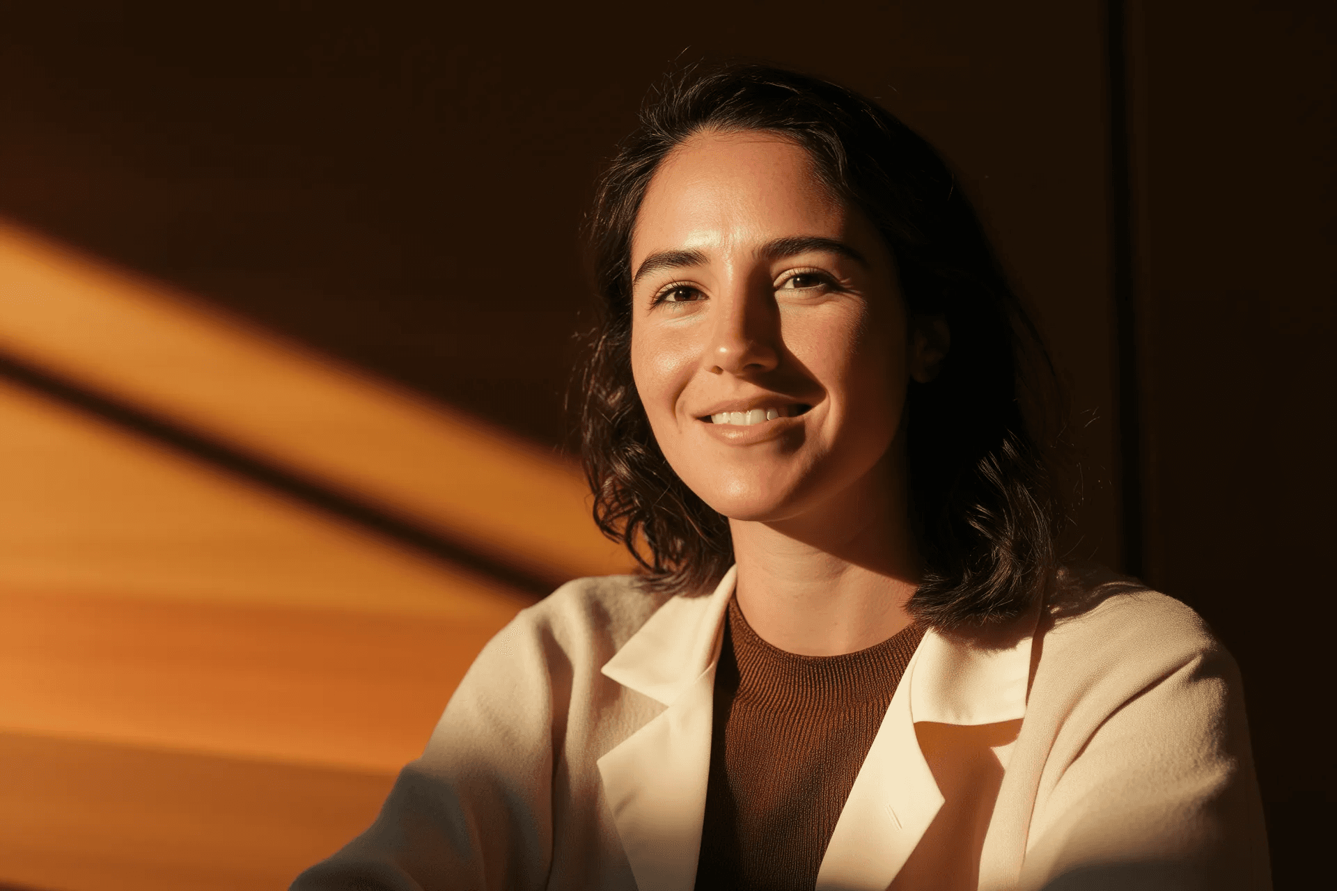 Continuum AI research scientist smiling in a lab